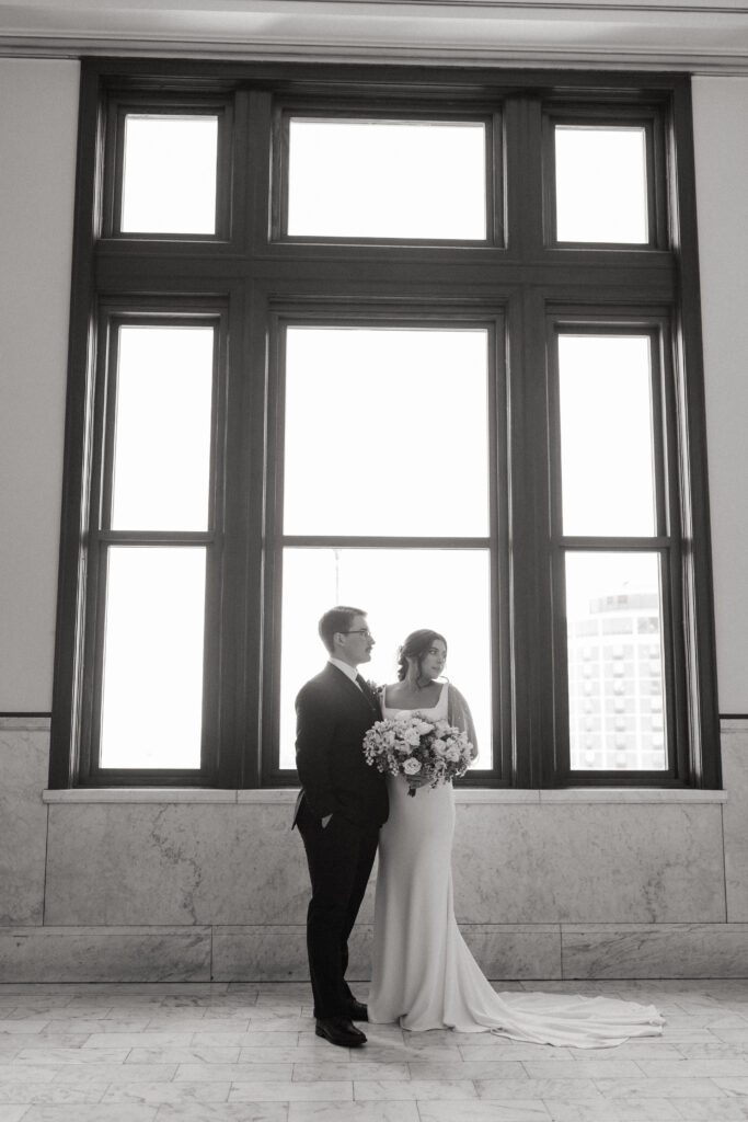 beautiful bride and groom photos with classy florals and elegant wedding decor