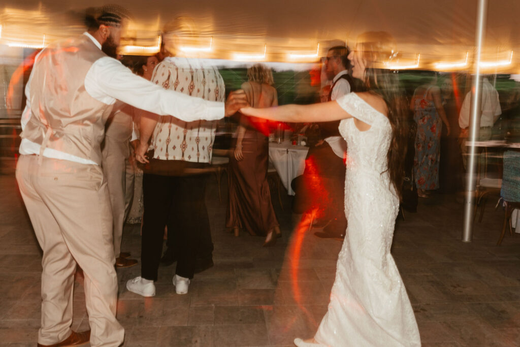 bride and groom dancing during reception
