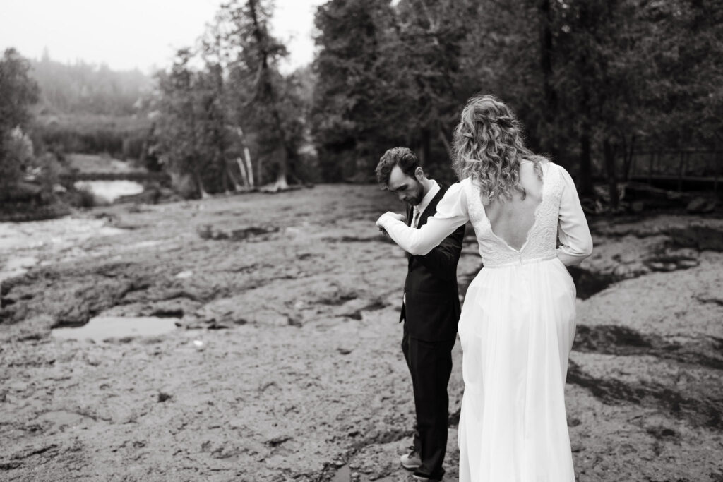 Post-ceremony, the adventurous trio embarks on a scenic 2.5-mile hike through Gooseberry Falls, capturing moments with fall foliage on their Lake Superior North Shore elopement