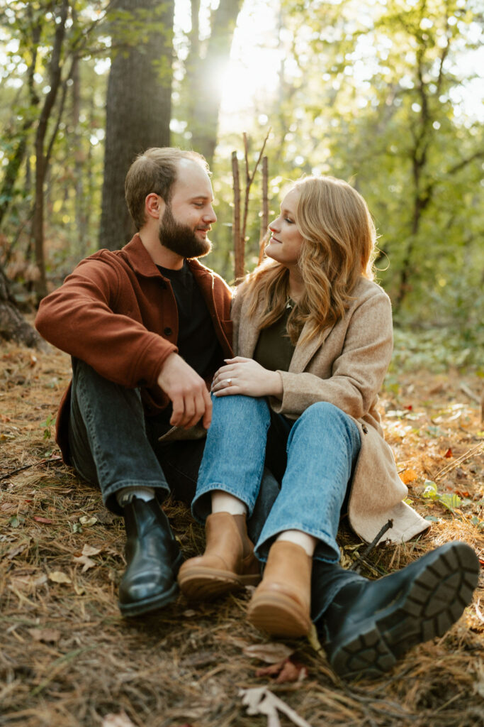 A picturesque park becomes the backdrop for Jona and Cyle's Minneapolis engagement photos, capturing the simplicity and beauty of their love.