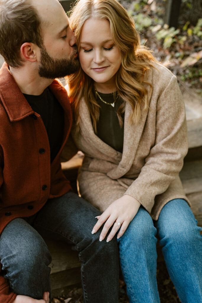 A picturesque park becomes the backdrop for Jona and Cyle's Minneapolis engagement photos, capturing the simplicity and beauty of their love.