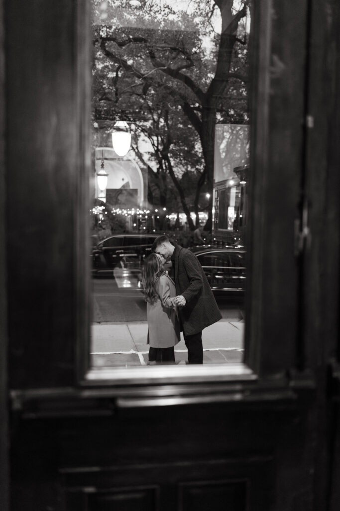 Window shots at The Blair House capture the couple's love in a cinematic style.