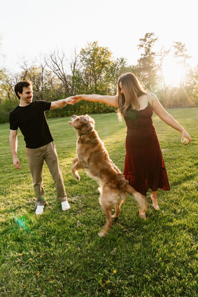 Couple runs around Como Park with their dog during their photoshoot