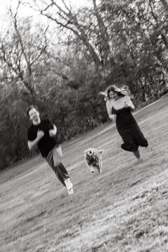 Couple runs around Como Park with their dog during their photoshoot