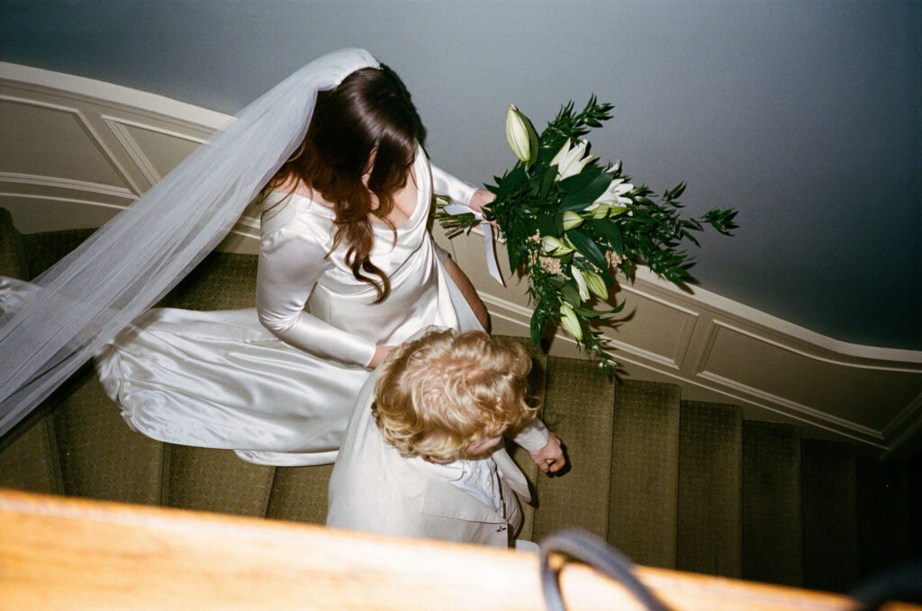 Film wedding photos of bride and groom