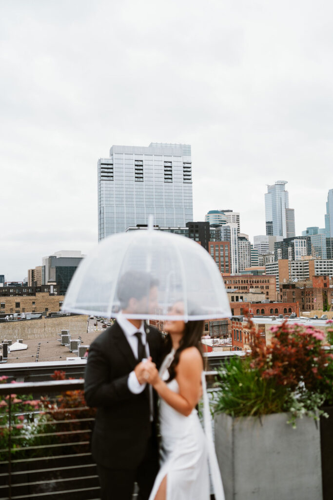 Rooftop engagement photos in downtown Minneapolis