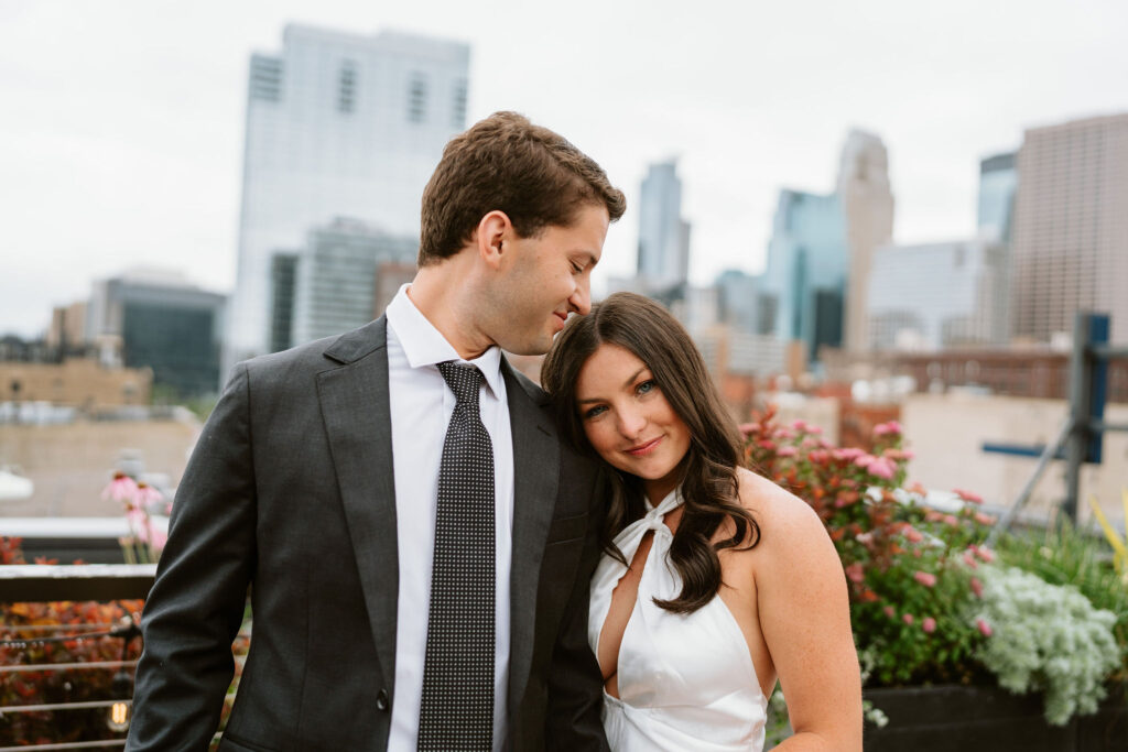 Rooftop engagement photos in downtown Minneapolis