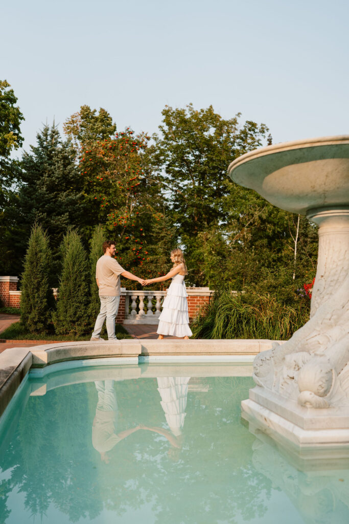 Classy engagement photos by the fountain at Glensheen Mansion