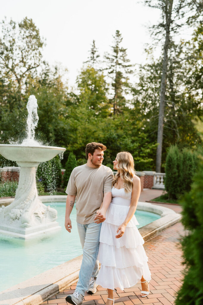 Classy engagement photos by the fountain at Glensheen Mansion