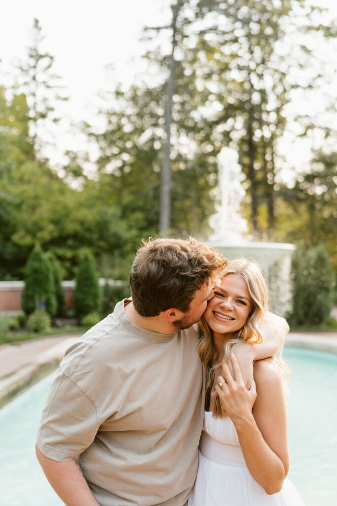 Classy engagement photos by the fountain at Glensheen Mansion