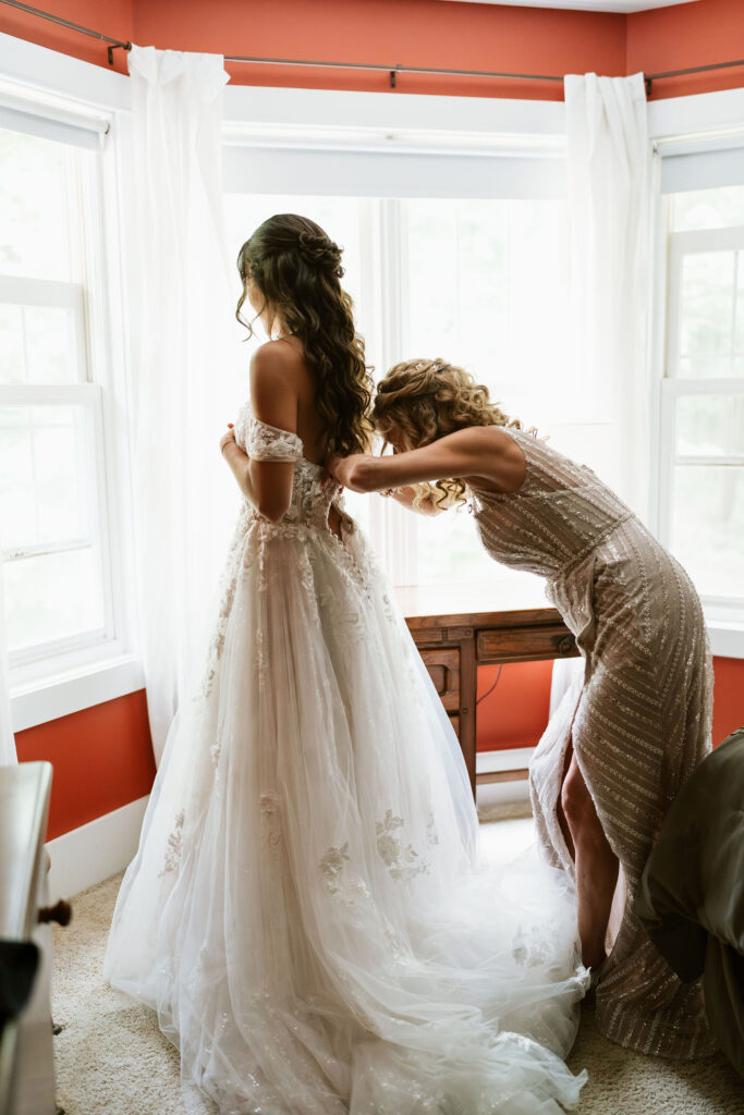 Bride gets ready in a Wisconsin home before their wedding ceremony