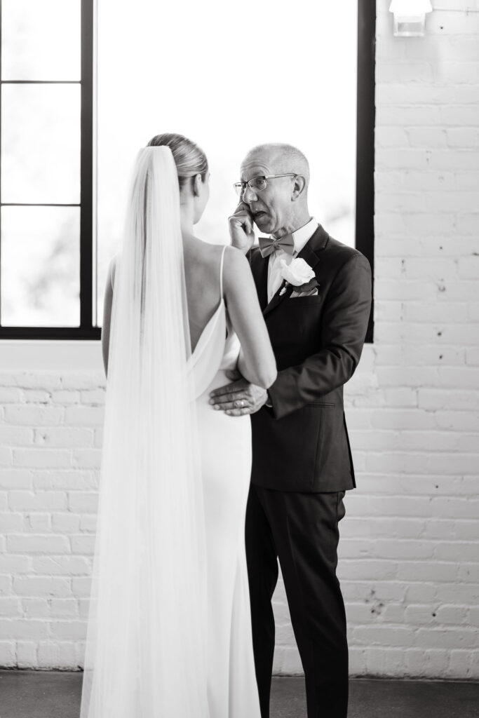 Bride and father first look