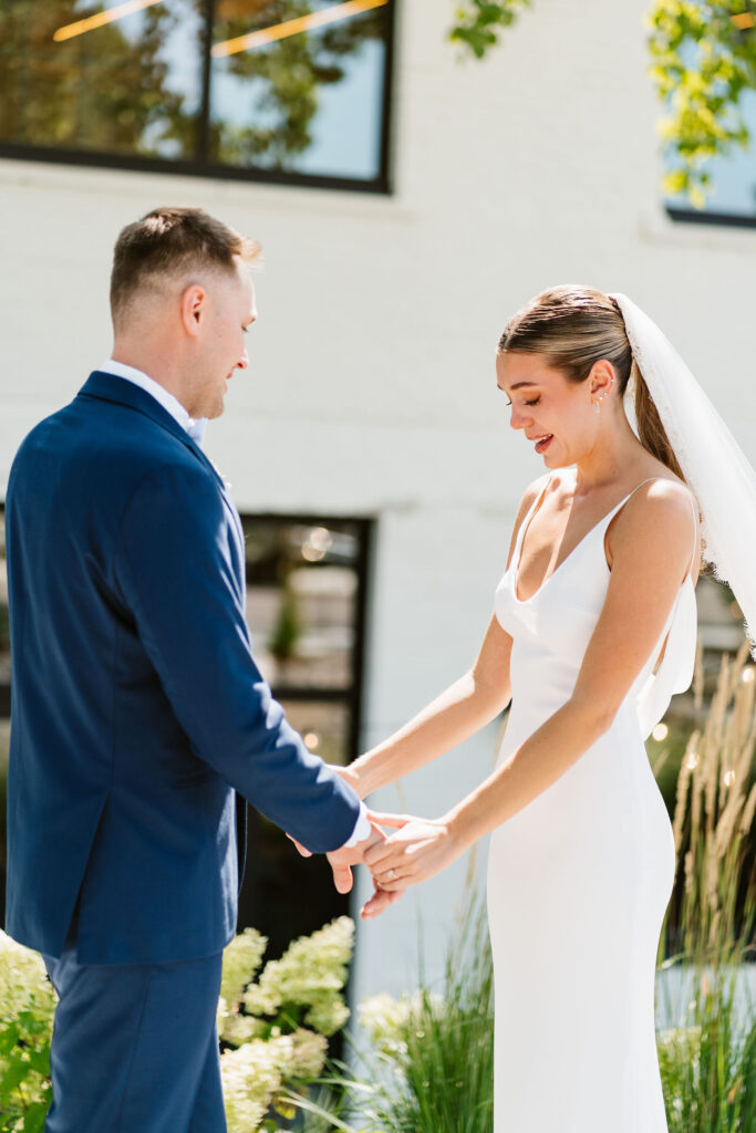 Documentary style first look photos at The Lowlands for a summer wedding