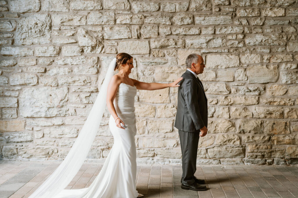 Bride and her father have an emotional first look moment