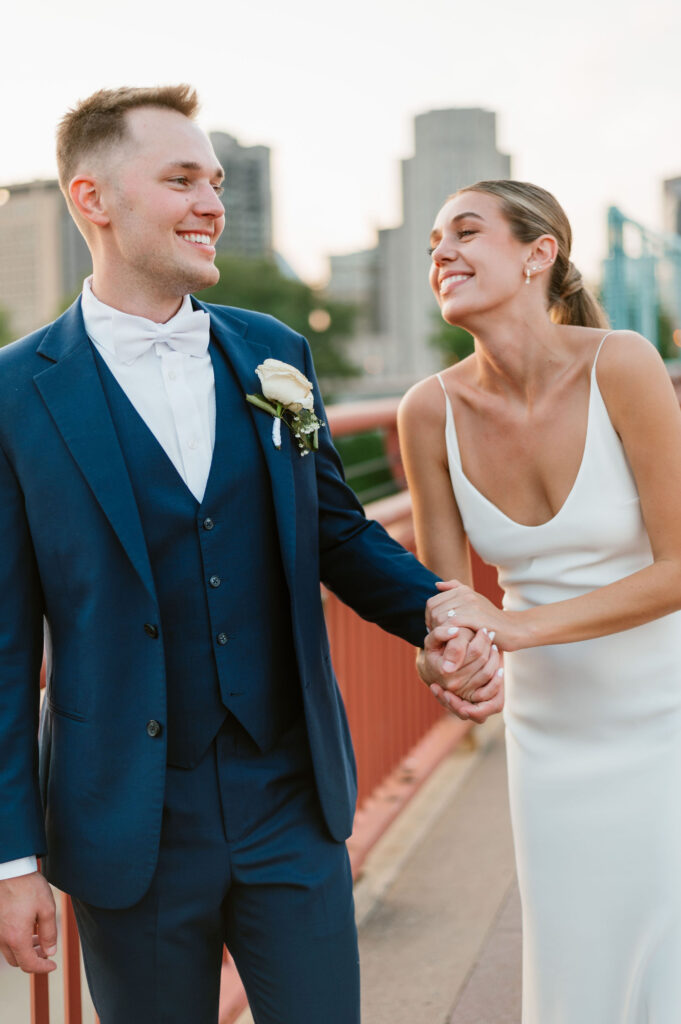 Documentary style wedding couple portraits at Wabasha Bridge in St. Paul