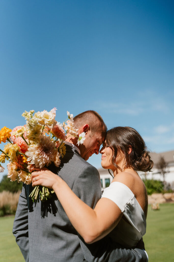 Bride and groom wedding portraits in Wisconsin on a perfectly sunny day