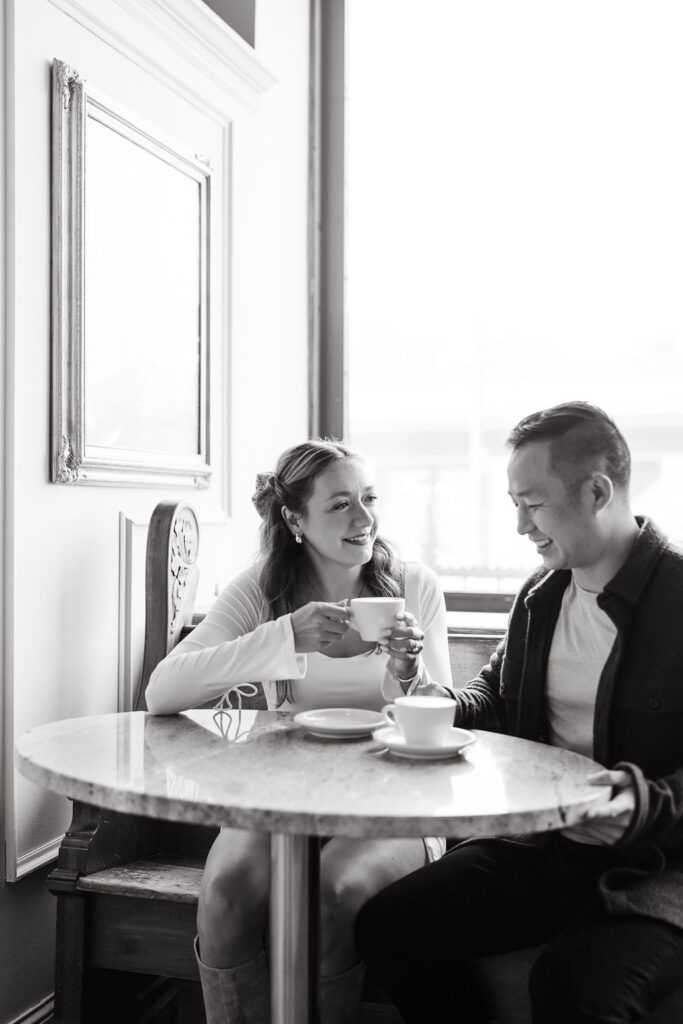 documentary-style engagement photos at Nina's Coffee in St. Paul