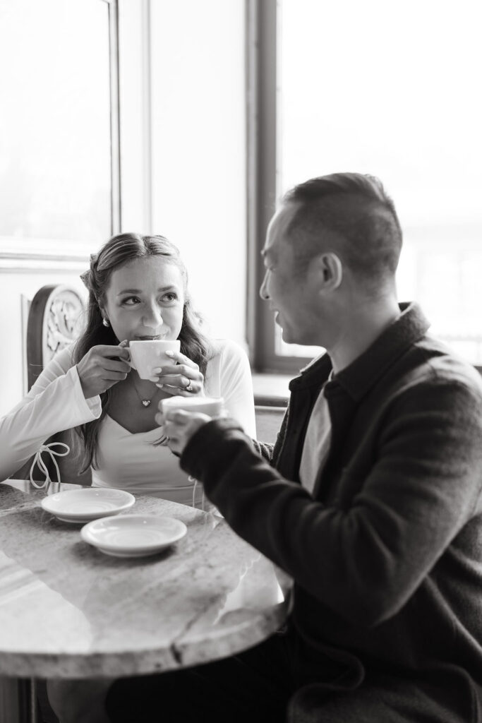 documentary-style engagement photos at Nina's Coffee in St. Paul