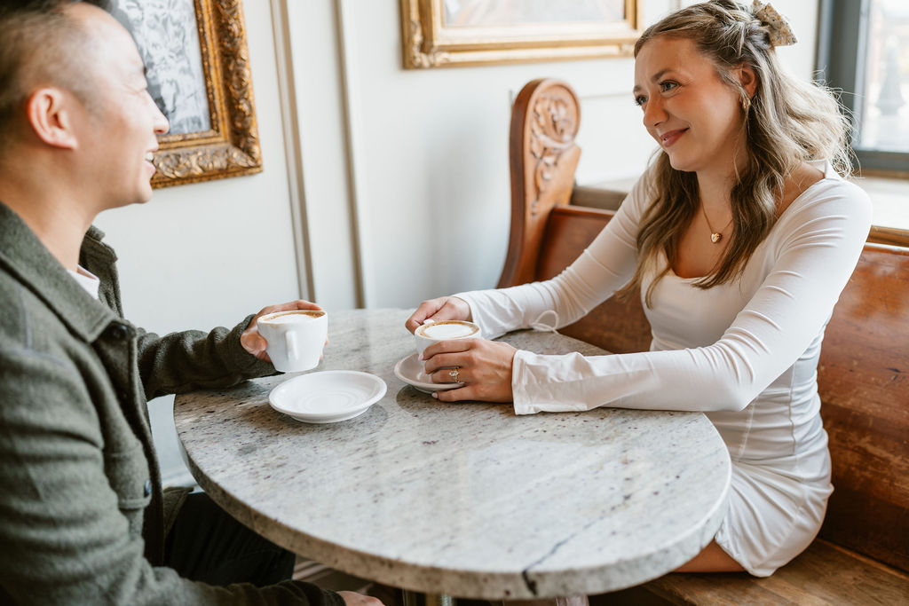 documentary-style engagement photos at Nina's Coffee in St. Paul