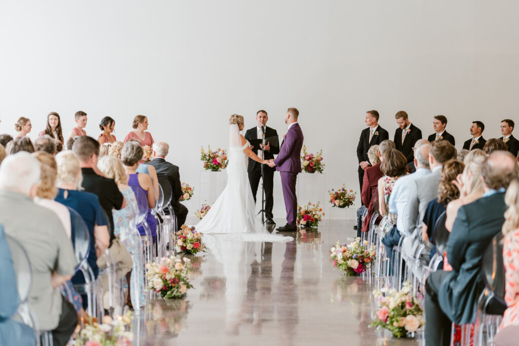 Couple has colorful wedding ceremony at Twin Cities venue Urban Daisy.