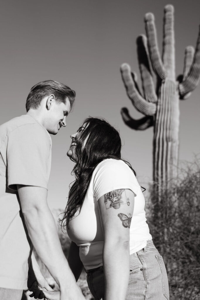 Candid engagement photos in the desert in Arizona