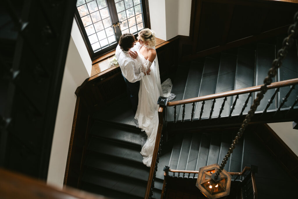 Wedding photo on the stair case of the Minneapolis Club a Twin Cities wedding venue.