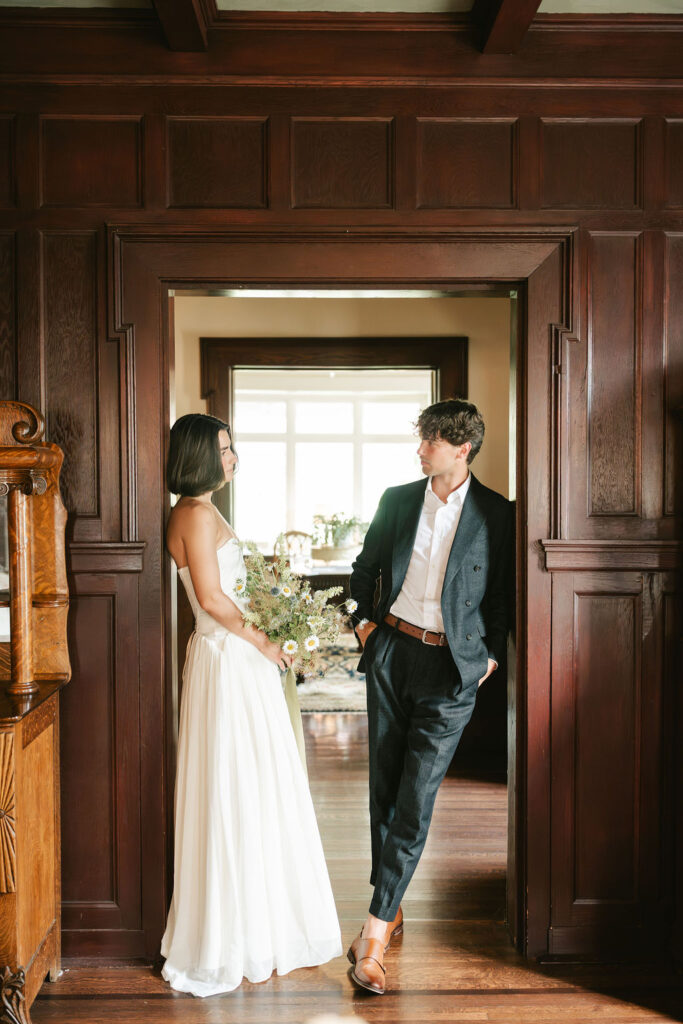 Couple takes portraits at 300 Clifton, a perfect space for your Minneapolis small wedding