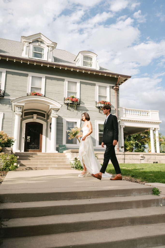 Couple takes portraits at 300 Clifton, a perfect space for your Minneapolis small wedding
