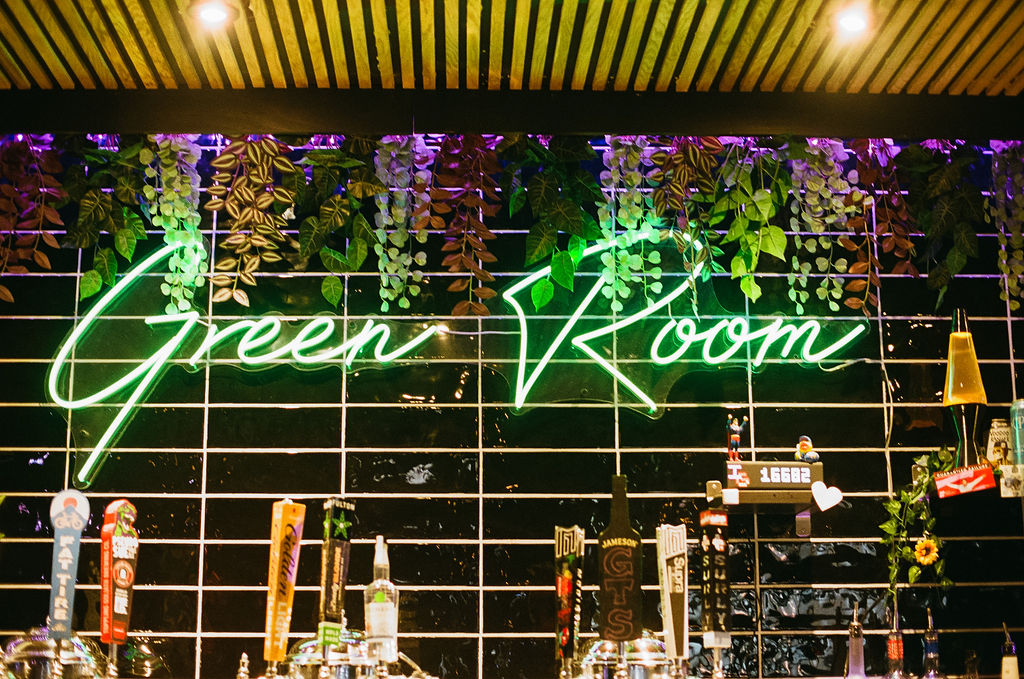 Neon on sign for 'green room' minneapolis