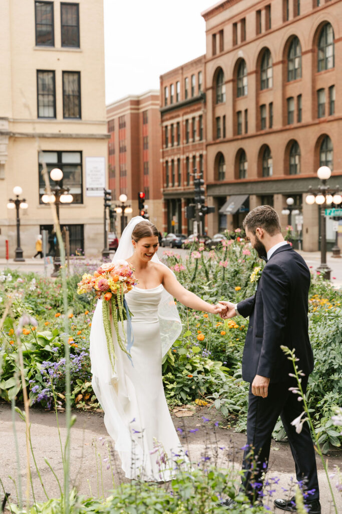 Bride and groom first look in downtown St. Paul