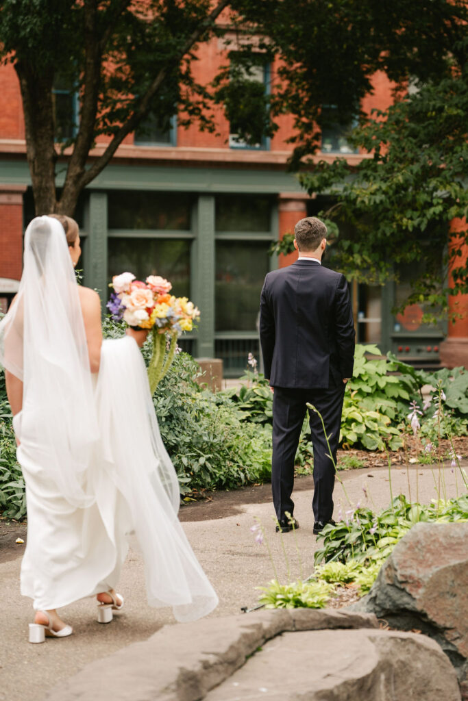 Bride and groom first look in downtown St. Paul