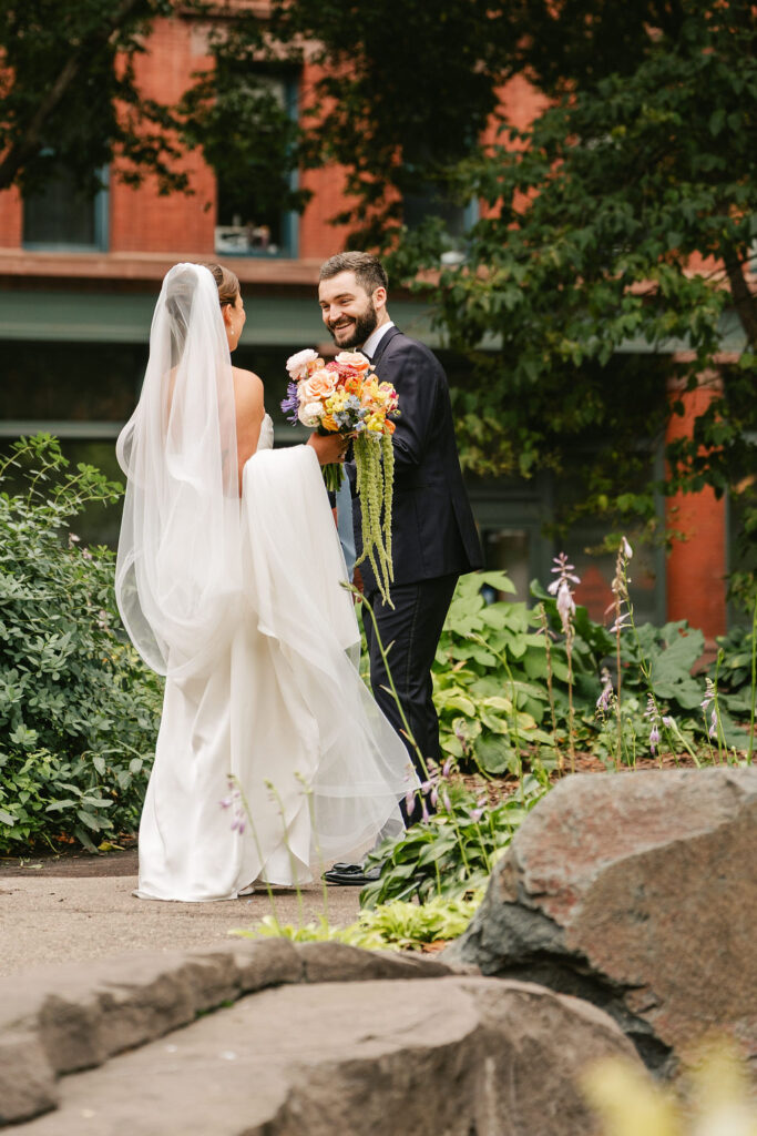Bride and groom first look in downtown St. Paul