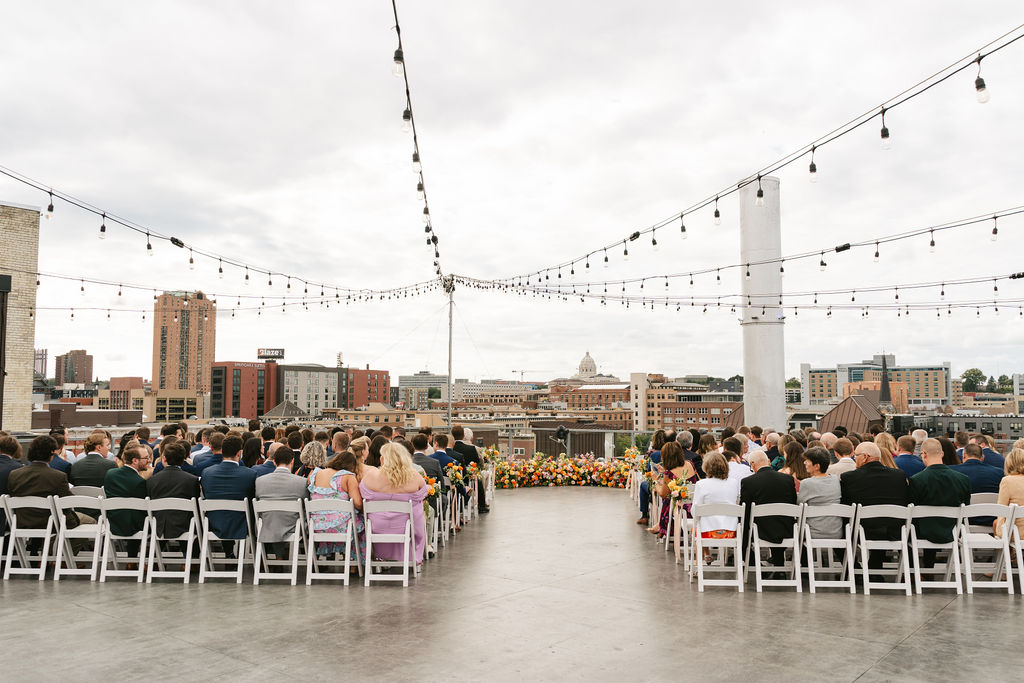 Downtown St. Paul wedding ceremony on the rooftop of A'BULAE