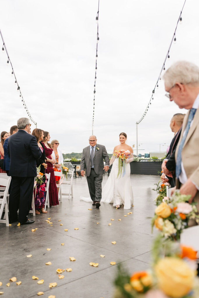 Downtown St. Paul wedding ceremony on the rooftop of A'BULAE