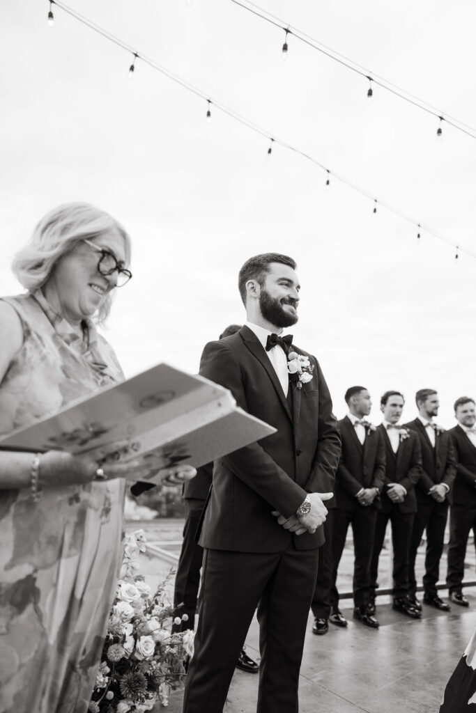 Downtown St. Paul wedding ceremony on the rooftop of A'BULAE