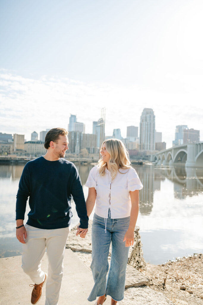 Sunny surprise proposal in Minneapolis at St. Anthony Main