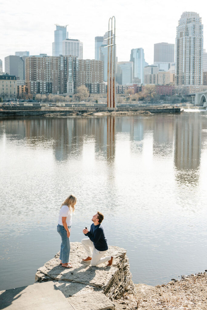 Sunny surprise proposal in Minneapolis at St. Anthony Main