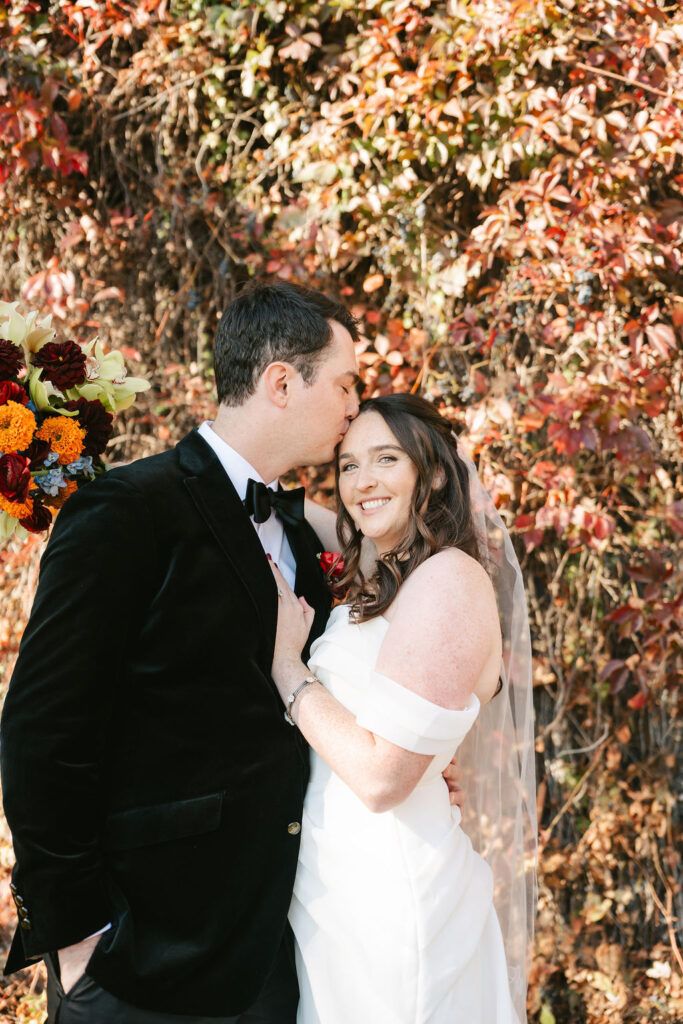 Fall bride and groom photos with colorful foliage