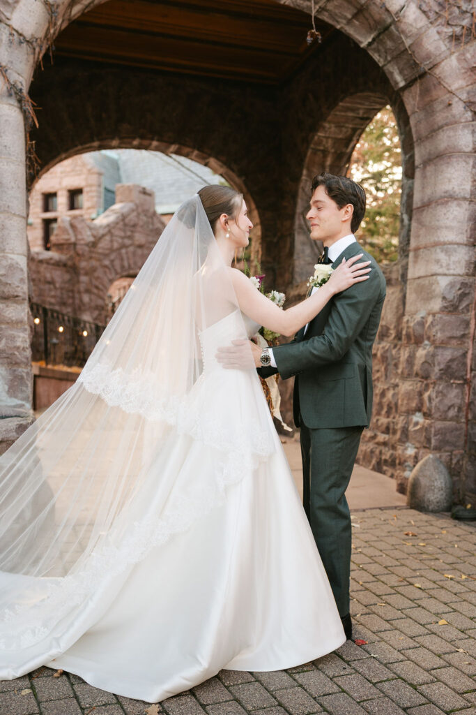 Bride and groom outside The Van Dusen Mansion