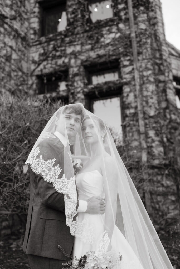 Bride and groom outside The Van Dusen Mansion
