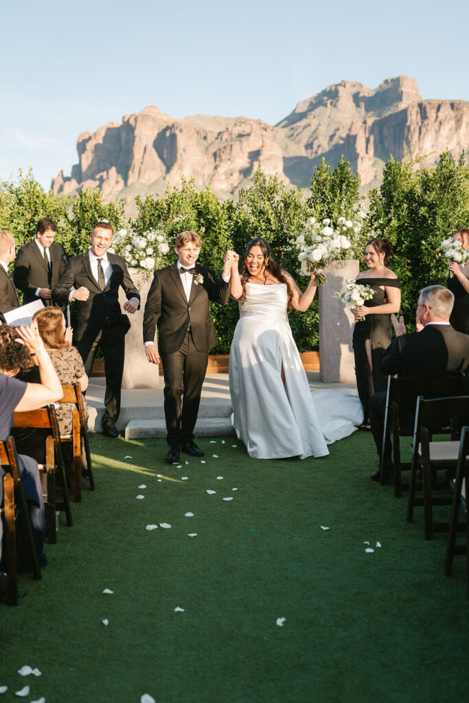Arizona desert wedding ceremony at The Paseo with the Superstition Mountains in the backdrop
