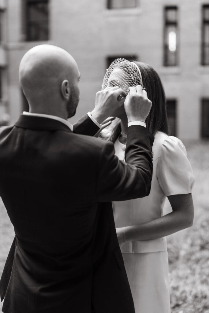 Bride and groom prepare for their Minneapolis City Hall wedding