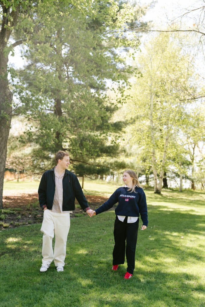 Spring engagement photos at Noerenberg Gardens after a lakeside proposal
