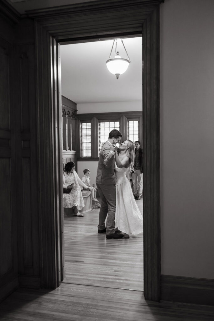 Bride and groom dance in the foyer of a private estate in St. Paul MN